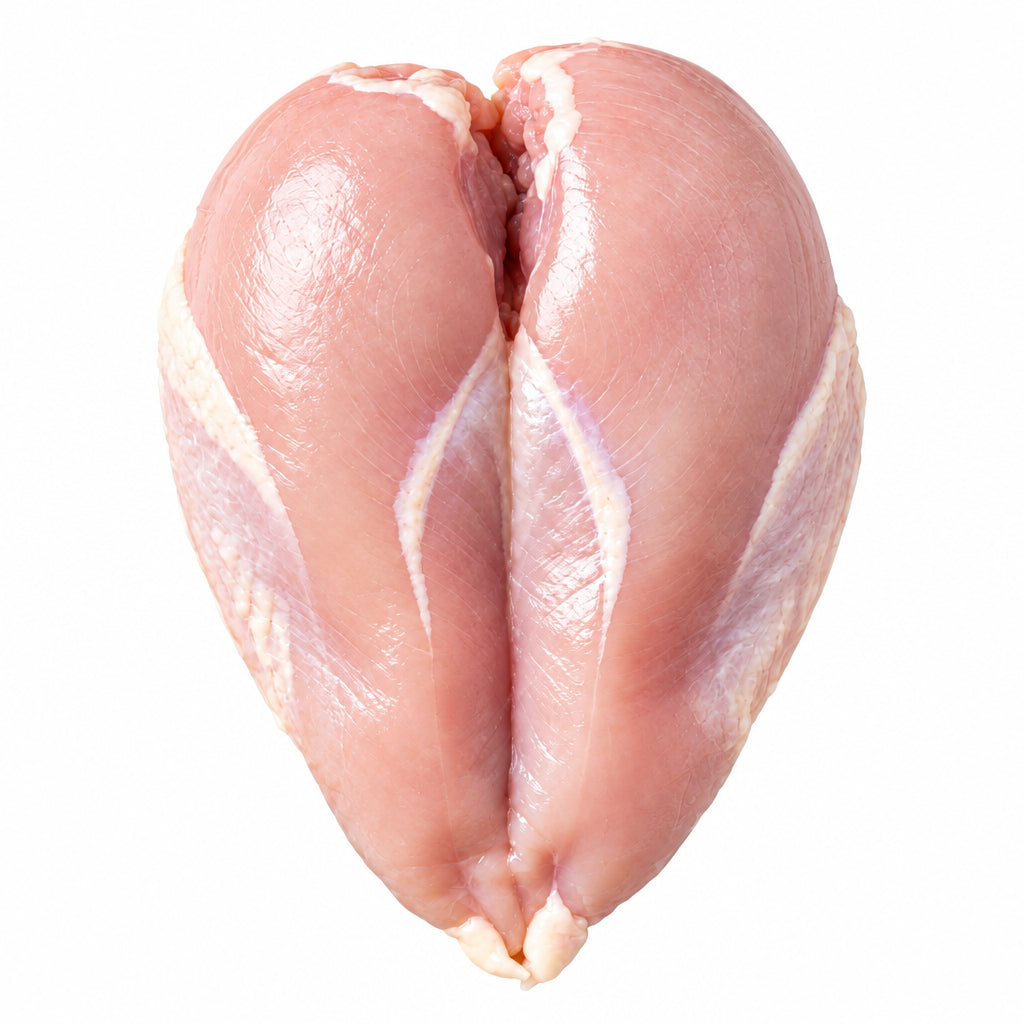 Raw chicken breast butterfly cut on a plain white background