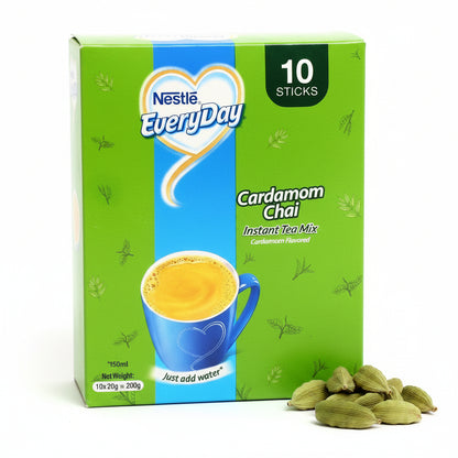 Nestle Everyday Cardamom Chai instant tea mix packaging with a cup of tea and cardamom beans on a white background.