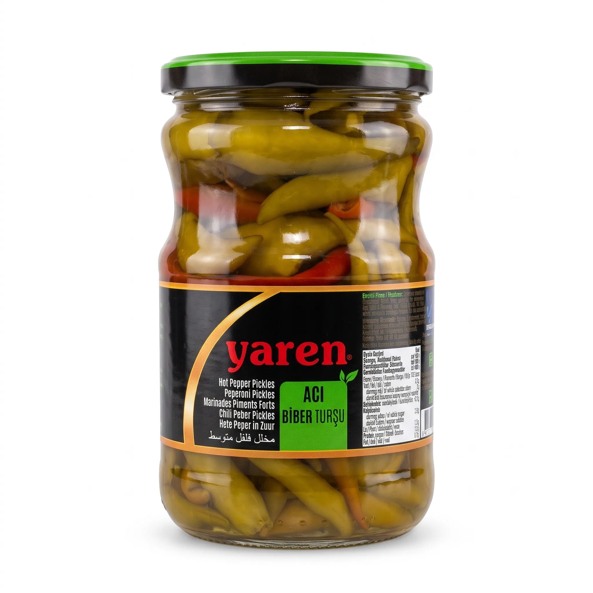 A glass jar of Varen Hot Pepper Pickles, featuring green chili peppers in brine with red pepper slices, sealed with a black lid and a black, orange, and green label.